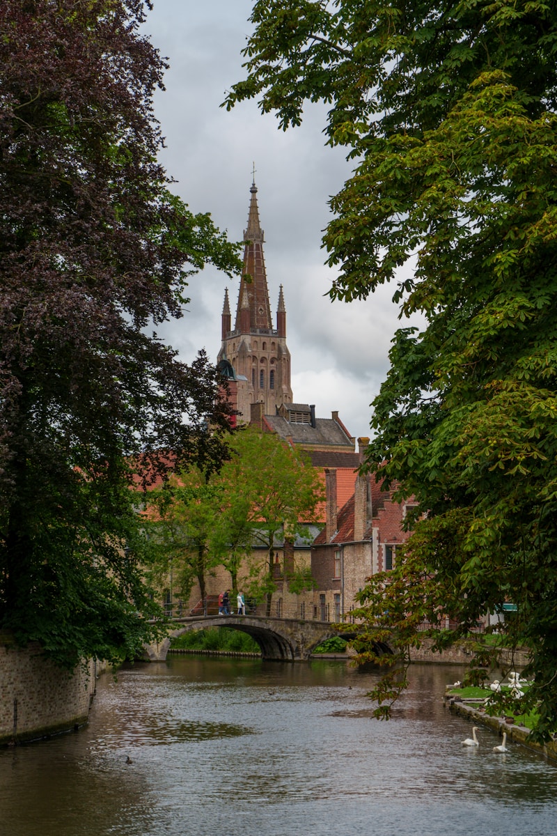 A river running through a city next to tall buildings
